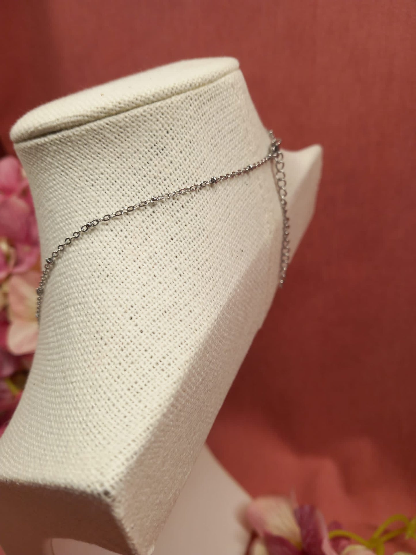 COLGANTE+CADENA árbol con circonitas de colores.