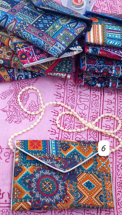 SELECCIONA TU CLUTCH "SUEÑO EN LA INDIA"FAVORITO.TODA UNA EXPRESIÓN DE ARTE Y EXCLUSIVIDAD.ENVÍO GRATIS SIN PEDIDO MÍNIMO.
