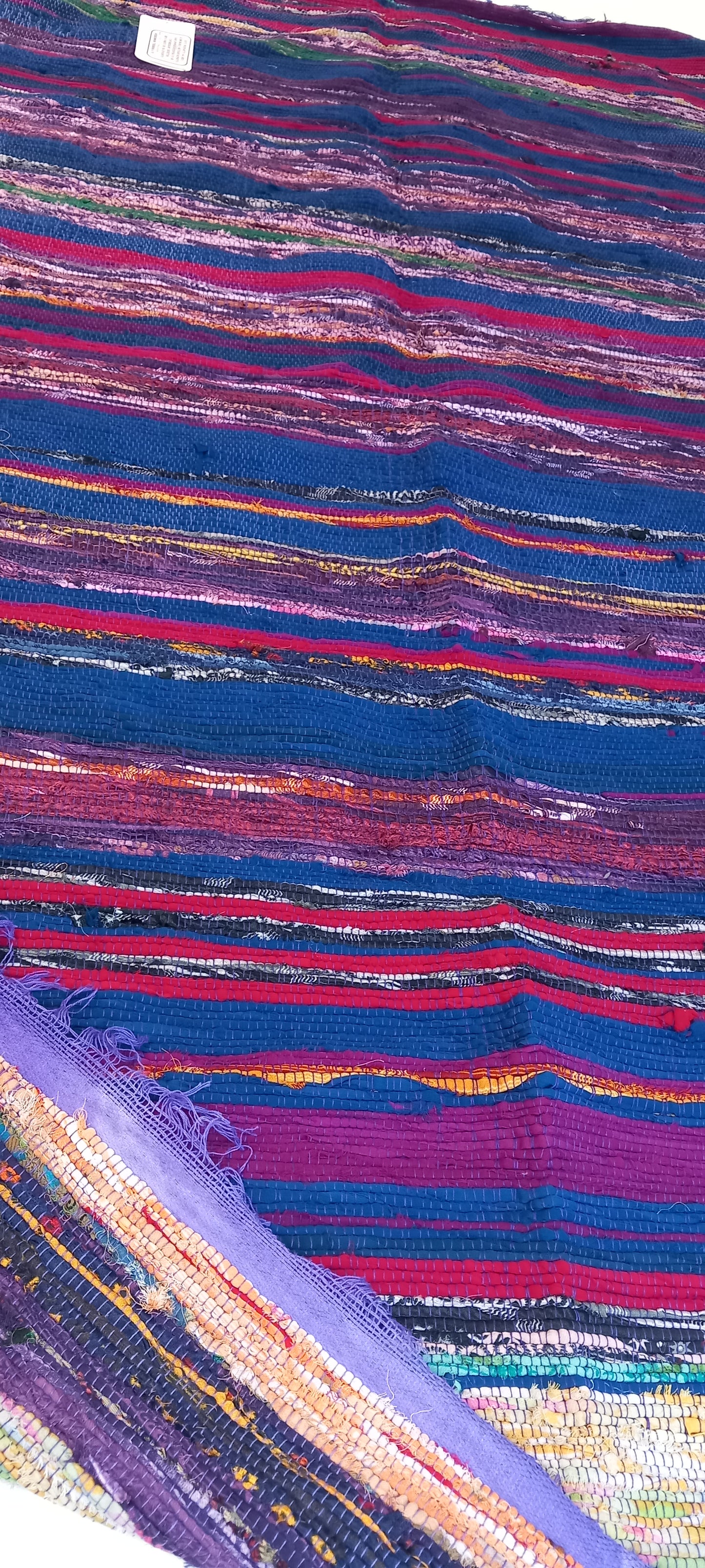 JARAPA PLAID ALFOMBRA FLECO MORADO,MODELO TEMPLO MULTIUSOS Y MULTICOLOR 100X200CM.TEXTURA Y TRADICIÓN EN UNA SOLA PIEZA.ENVÍO GRATIS SIN PEDIDO MÍNIMO.