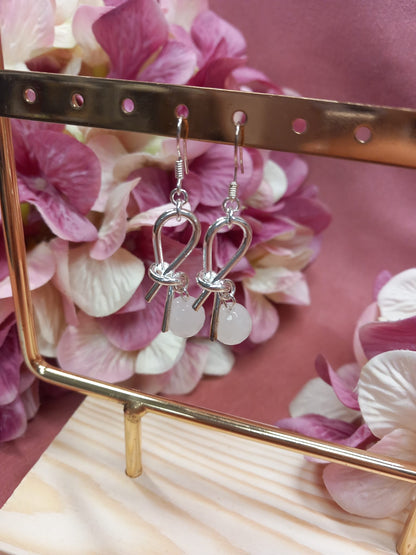 Silver-plated dangling earrings with stones for women.