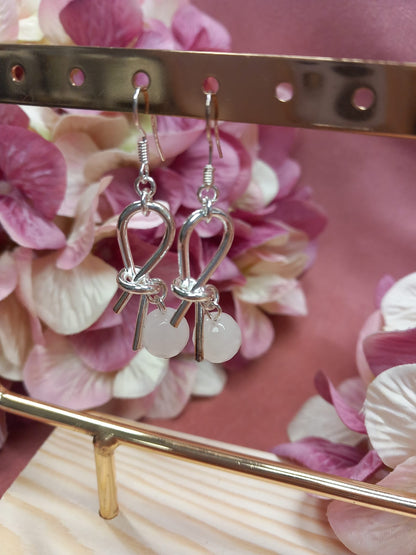 Silver-plated dangling earrings with stones for women.