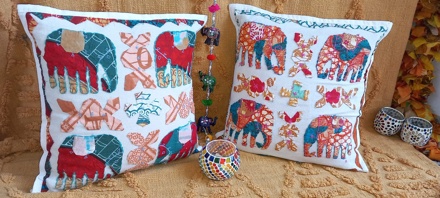 Pack 2 fundas de cojín DHARMA INDIA. Un toque bohemio y artesanal para cualquier espacio. Este pack de 2 fundas de cojín elefante DHARMA INDIA son una pieza única, confeccionadas con retales de tejidos tradicionales llenos de historia. Sus vibrantes colores, detalles artesanales hechos a mano las convierten en un complemento perfecto para quienes buscan decorar con personalidad y autenticidad. Su apertura trasera facilita la colocación del relleno, aportando comodidad y practicidad.