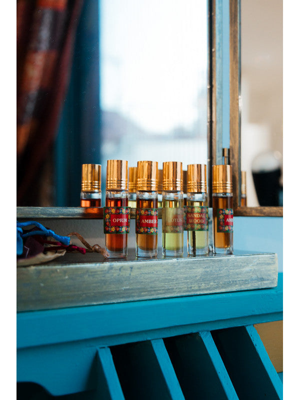 Perfume natural de la India con aplilcador Roll-on,envío gratis y precio sin competencia.