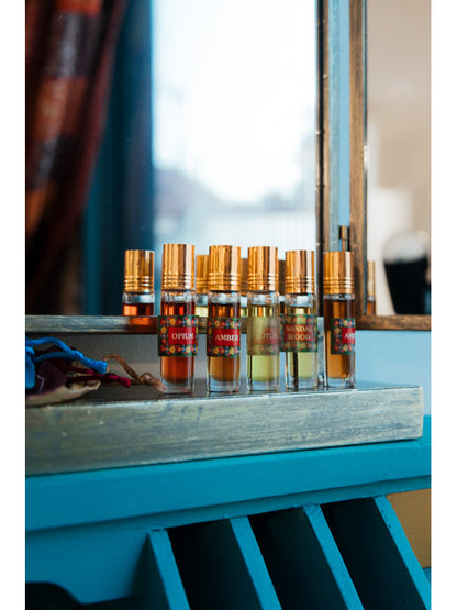 Perfume natural de la India con aplilcador Roll-on,envío gratis y precio sin competencia.