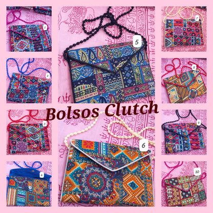 Cada uno de estos bolos clutch convierten cualquier look en una expresión de arte y exclusividad. El Clutch "sueño en la India" es una selección de piezas originales y únicas que aportan diferenciación inmediata a tu selección de accesorios. Este modelo es especial, con detalles artesanales que reflejan tradición, creatividad y sofisticación. Su diseño algodonado atemporal lo transforma en el complemento perfecto tanto para eventos como para elevar estilismos cotidianos. Ligero, práctico y con gran impacto 